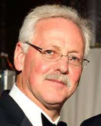 Image of gentleman with glasses larry korff