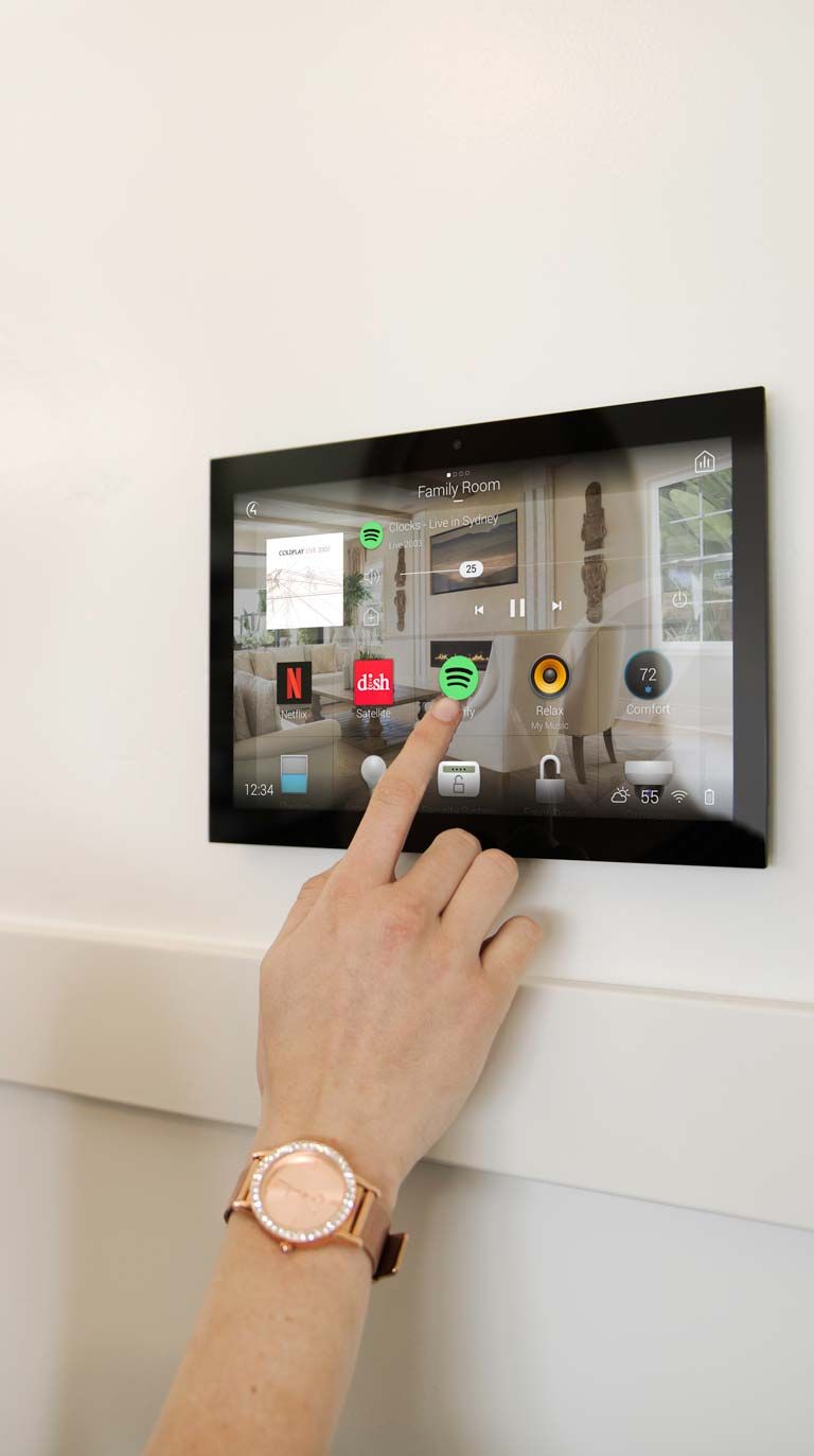 woman using touch panel on wall